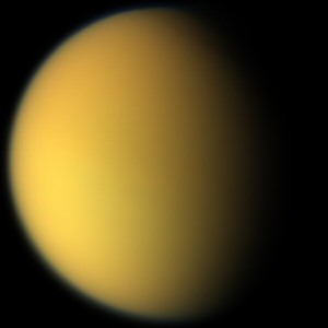 Titan has a thick, surface-obscuring atmosphere